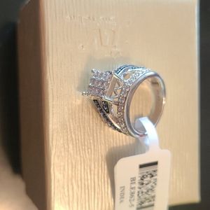 Tanzanite/wht diamond stimulants ring